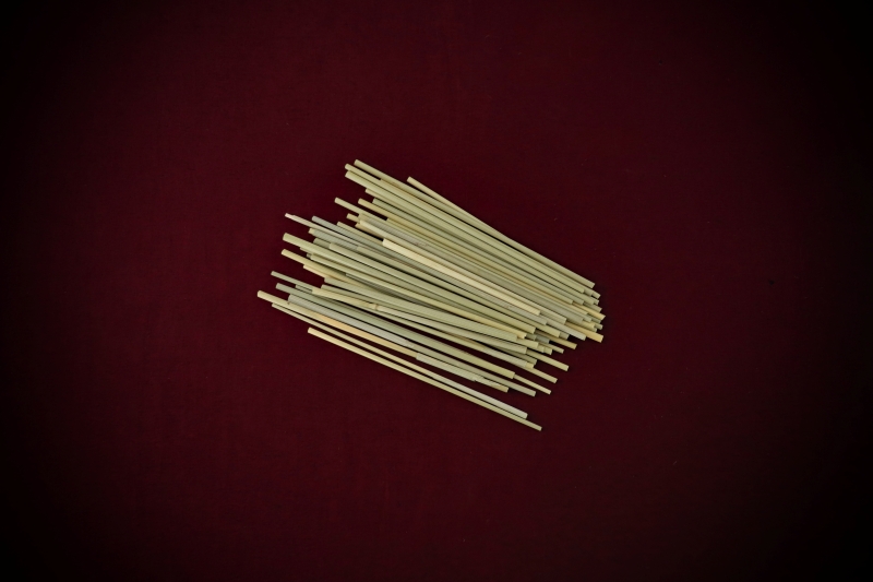 Dried Botanicals Wheatgrass Bare Stems—9 to 13cm lengths—displayed on a rich blood-red background by Gypsy Red Corpse.