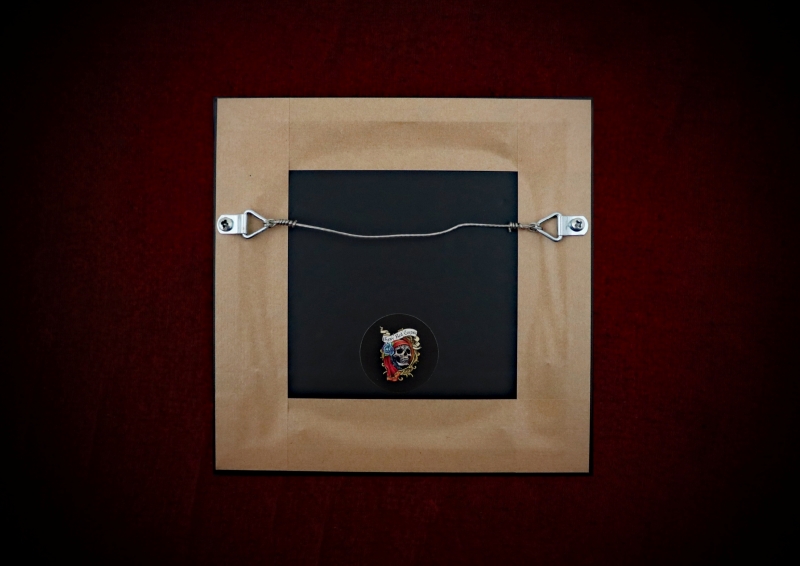 Detailed shot showing the back of a repurposed black shadow box frame handmade by a professional framer, showcasing traditional witchcraft decor.