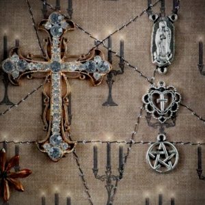 Detailed view of the 7cm sparkling diamante-loaded cross centrepiece inside a traditional gothic curiosity display frame.