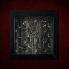 Repurposed black shadow box frame featuring an ornate metal mandala with three feather charms over a machine-sewn pentagram on a sepia crescent moon and stars backdrop.